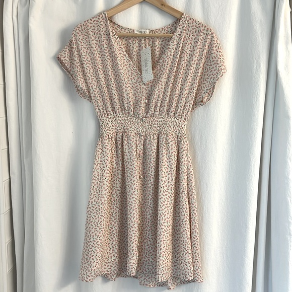 Sienna Sky Dresses & Skirts - XS Sienna Sky White Dolman Sleeve V-Neck Sundress with delicate pink flowers.